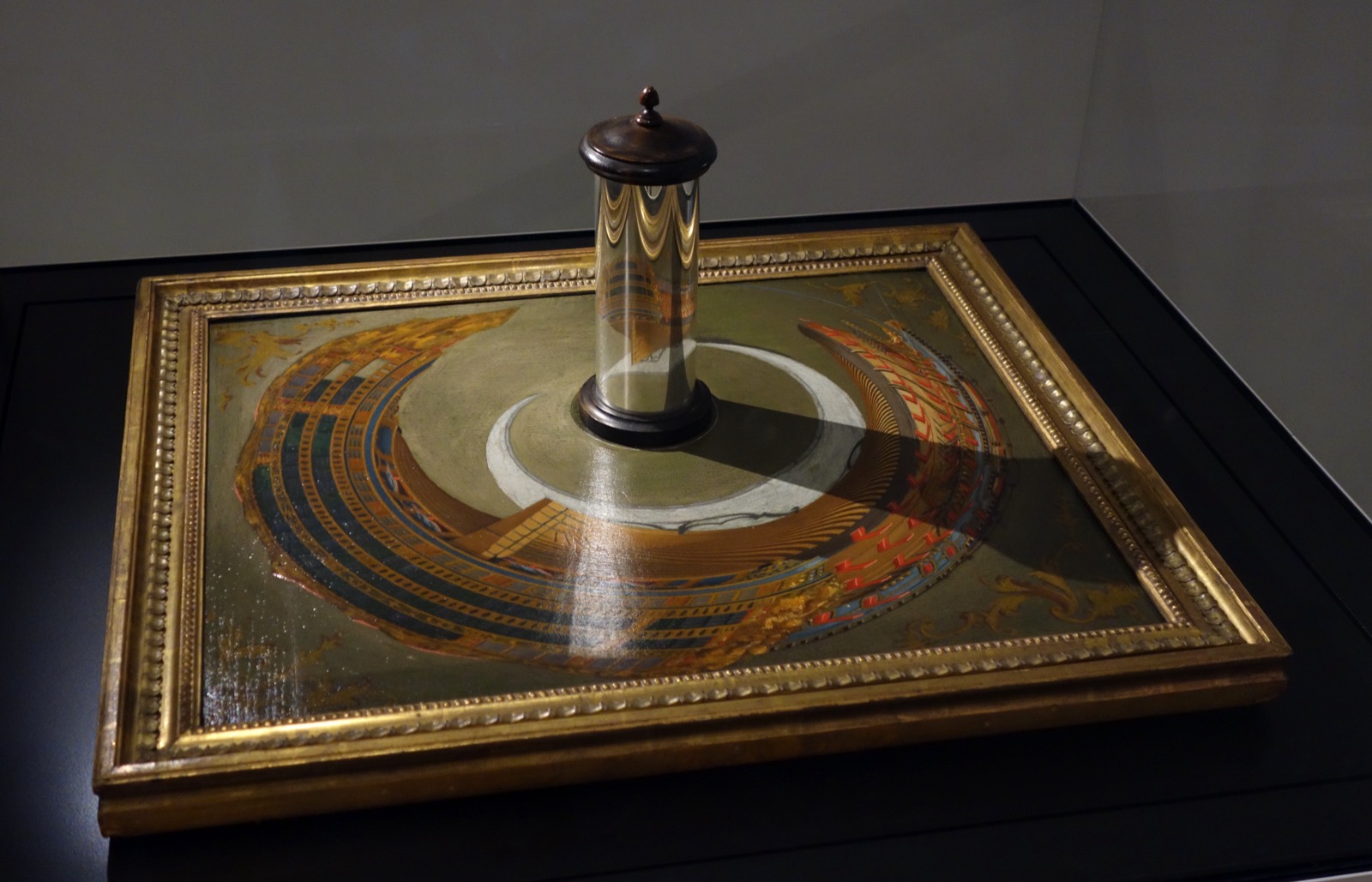 An eighteenth-century anamorphic painting of a ship, displayed in the Science Museum, London
