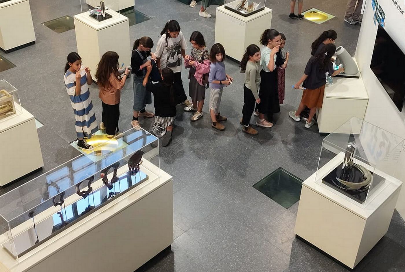 Visitors interacting with the exhibition — photograph 6