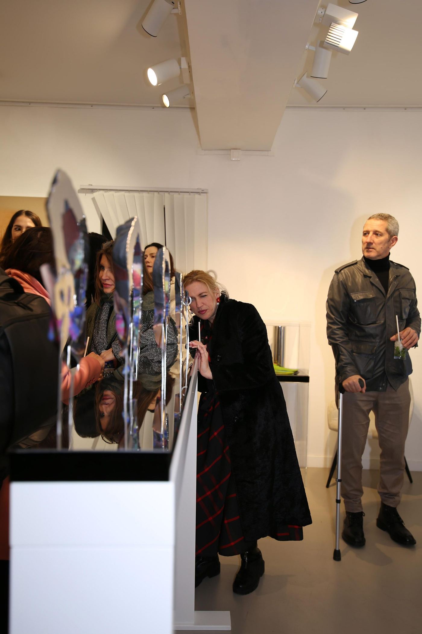 Visitors interacting with the exhibition — photograph 15