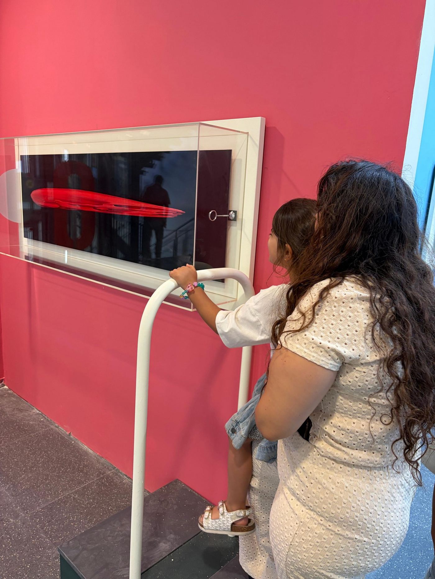 Visitors interacting with the exhibition — photograph 29